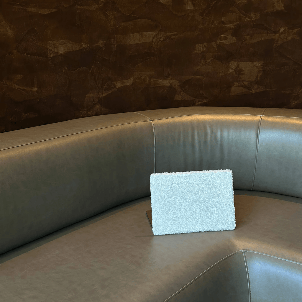 CINNA teddy MacBook cover in hotel setting